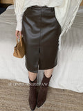 Xixi 2025 Autumn And Winter White Standard Temperament Pure Color High-Waist Half-Skin Skirt Ass A Word Short Skirt Women's Tide
