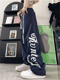 school baggy sweatpants with seams and logo