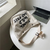 Young Wild and Free Canvas Crossbody BagOutfit