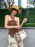 Xixi 2025 Summer New Korean Version Pure Temperament Hanging Neck Knitted Bottom Sling Vest Women