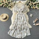 New Seaside Holiday Dress Women Spring And Autumn 2025 New Sexy V Receive Lanky