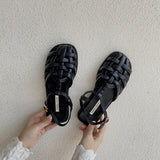 Bag Head Hollow Sandals Women 2025 New Summer Braided Flat Shoes Niche Retro Beach Roman