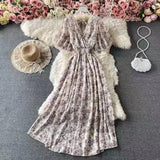 New Seaside Holiday Dress Women Spring And Autumn 2025 New Sexy V Receive Lanky
