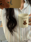 long-sleeved shirt with button placket and colorful stripe