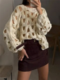 Women's Casual Solid Color Leisure Resort Beach Hollow With Long-Sleeved Sweater