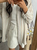 long-sleeved shirt with button placket and colorful stripe