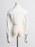 New Fashion Temperament Pure Color Stand Collar Single Breasted Irregular Splicing Design Sense Short Crop Shirt