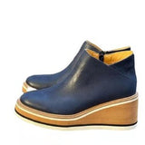 Slope And Short Boots Women 2025 Autumn And Winter New Flat Bottom Zipper Round Head Solid Color Bare Boots Thick Bottom Leather