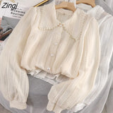 Design Hollow Out Blouse Women Korean Pearl Button Puff Sleeve Tops Elegant Peter Pan Collar Lace Patchwork Shirt