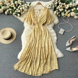 New Seaside Holiday Dress Women Spring And Autumn 2025 New Sexy V Receive Lanky