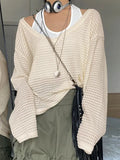 vintage cut out knitted sweater with loose fit and V