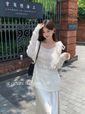 Xixi 2025 Autumn White Standard Temperament With Hollow Long Sleeves Pure Color Knitwear Sweater Sweater Women