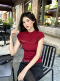 Xixi 2025 Autumn New Temperament Pure Color Round Collar Hollow Knitted Shirt Toped Women