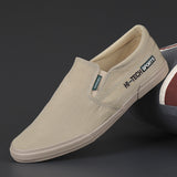 Men's Shoes Korean Version Of Fashion Casual Shoes Pure Color Trend Shoes One Foot Lazy Shoes Set Sail Canvas Shoes Flat Plate