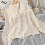 Design Hollow Out Blouse Women Korean Pearl Button Puff Sleeve Tops Elegant Peter Pan Collar Lace Patchwork Shirt