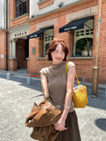 Xixi 2025 Autumn New Temperament Pure Color Round Collar Hollow Knitted Shirt Toped Women