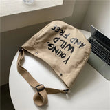 Young Wild and Free Canvas Crossbody BagOutfit