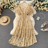 New Seaside Holiday Dress Women Spring And Autumn 2025 New Sexy V Receive Lanky